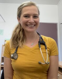 female doctor smiling at cqamera
